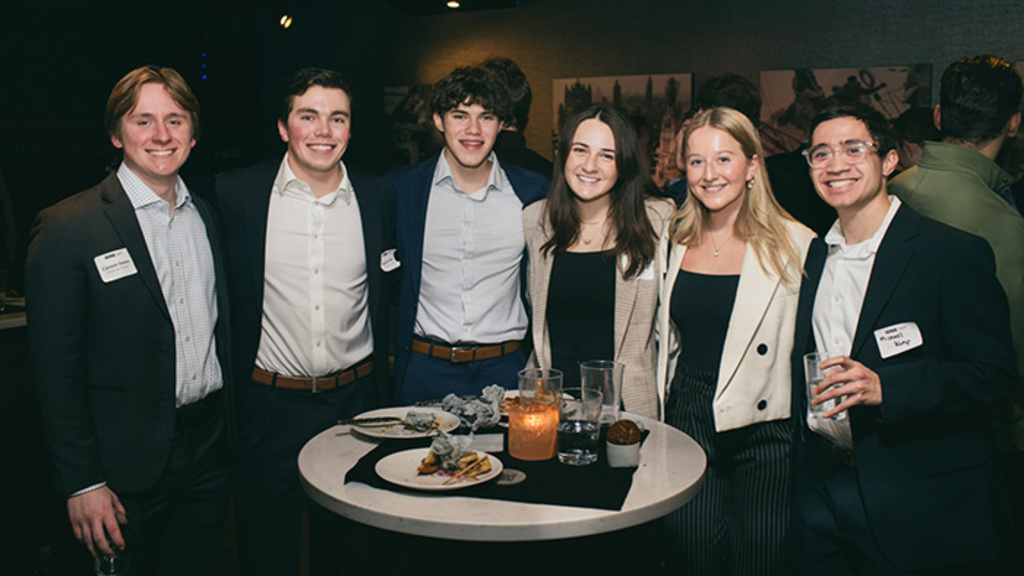 Six people at a Tippie event in Chicago